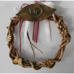 Wooden wreath with bronze eye 